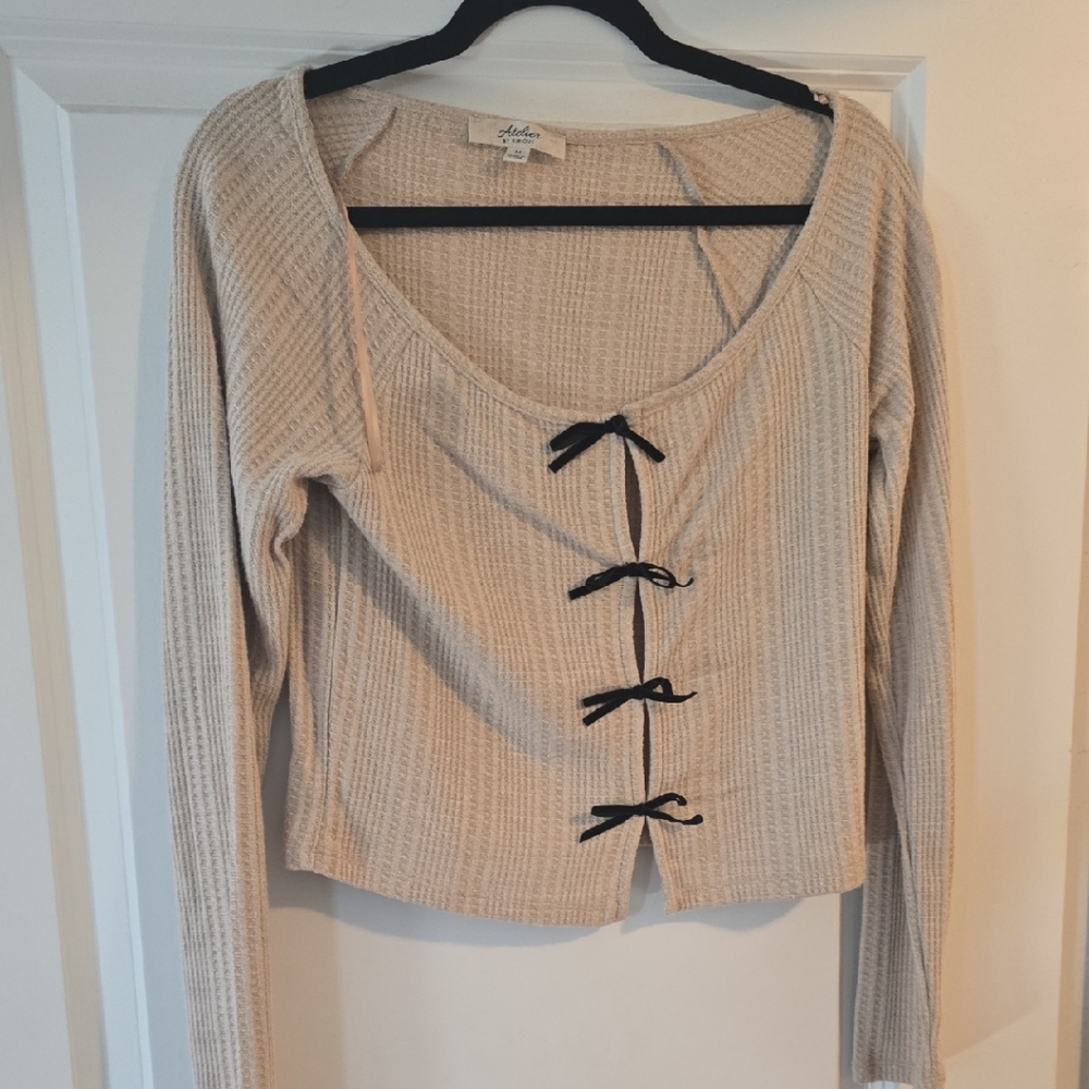Cream Long Sleeve Top with Black Bow Accents